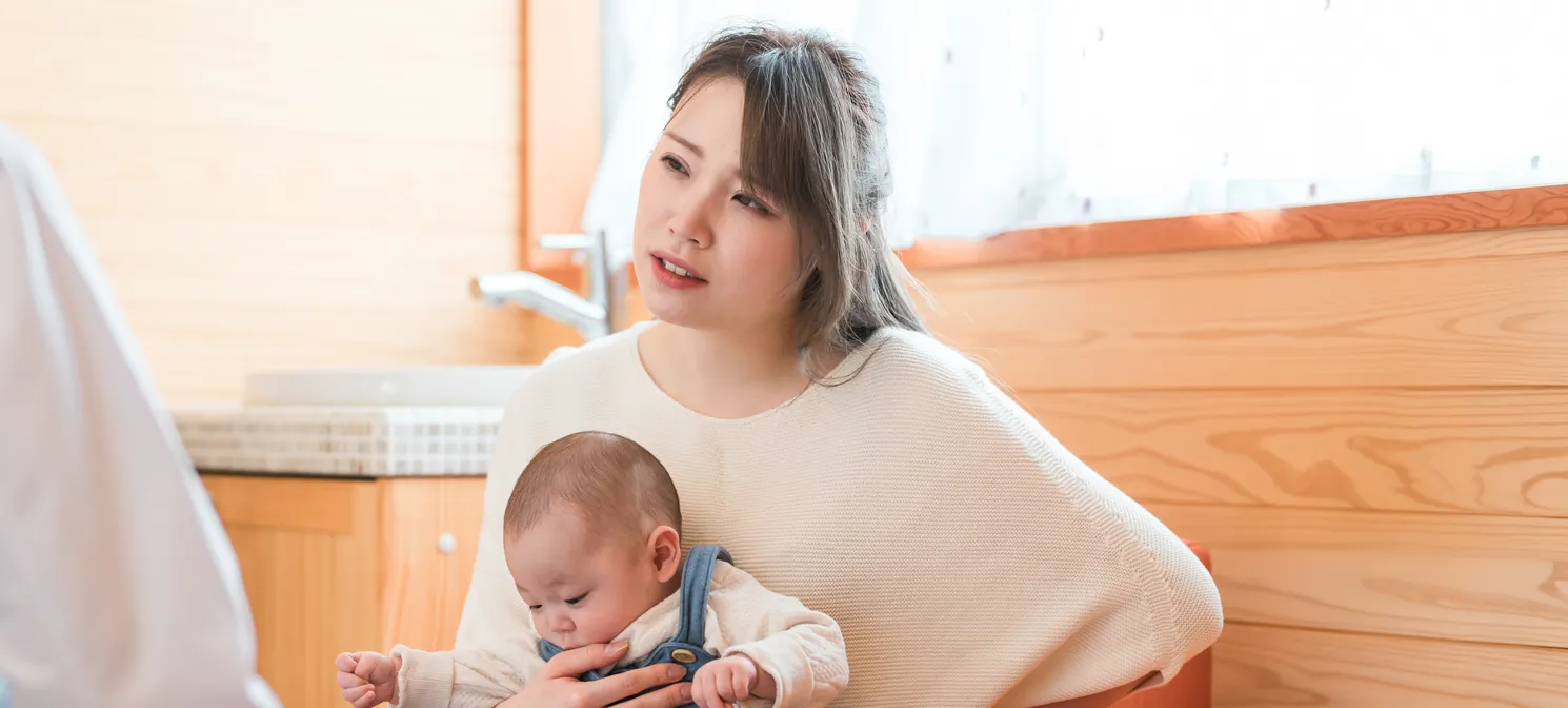 骨盤が痛む女性
